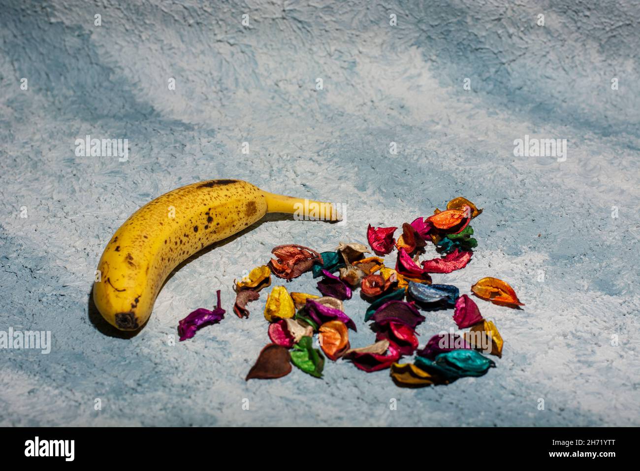 ripe bananas on a blue background Stock Photo