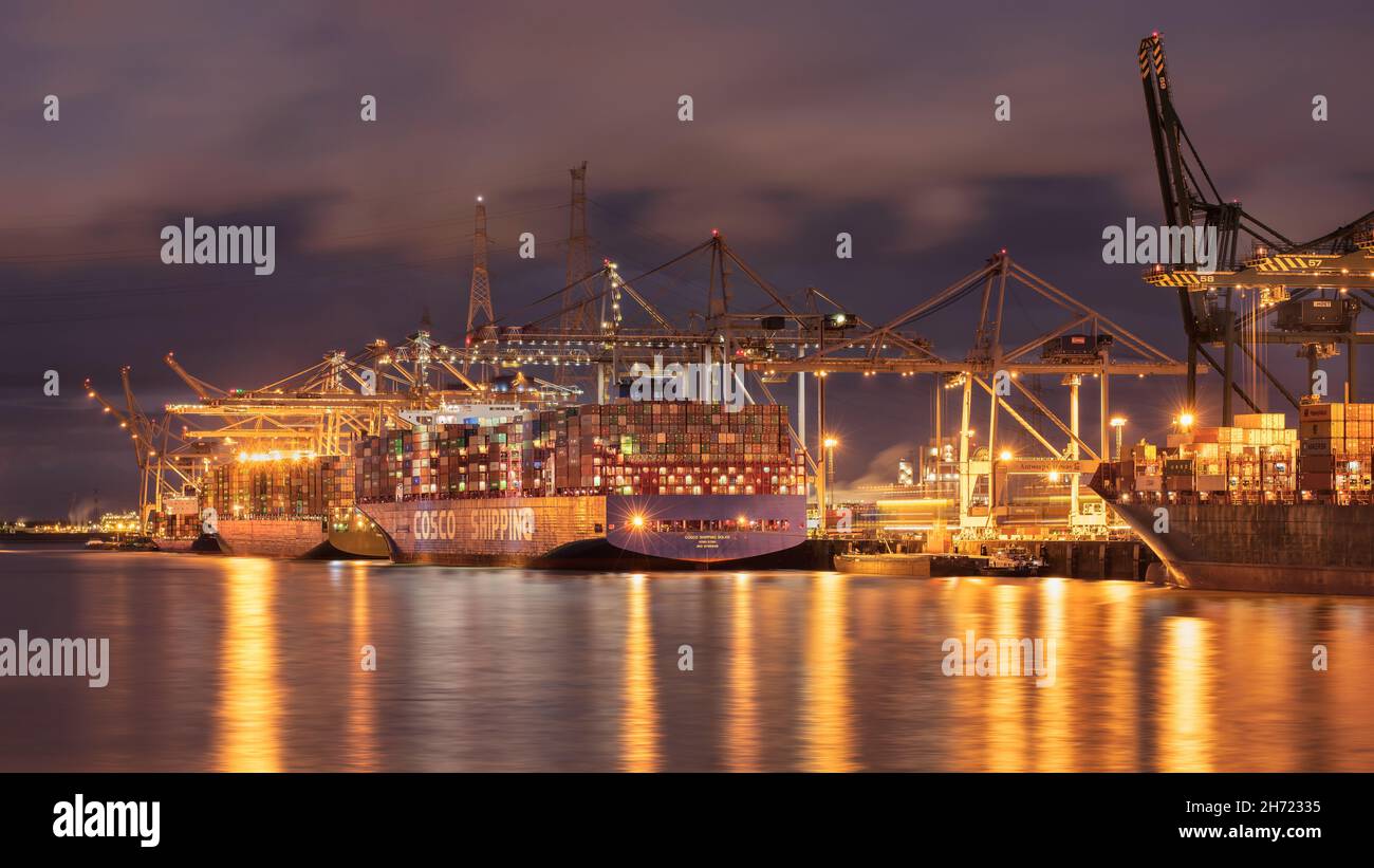 ANTWERP-NOV 13, 2021. Illuminated container terminal at night. Thanks ...