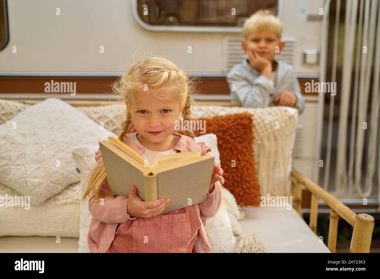 Kids having fun at the trailer summer camping stock photo alamy