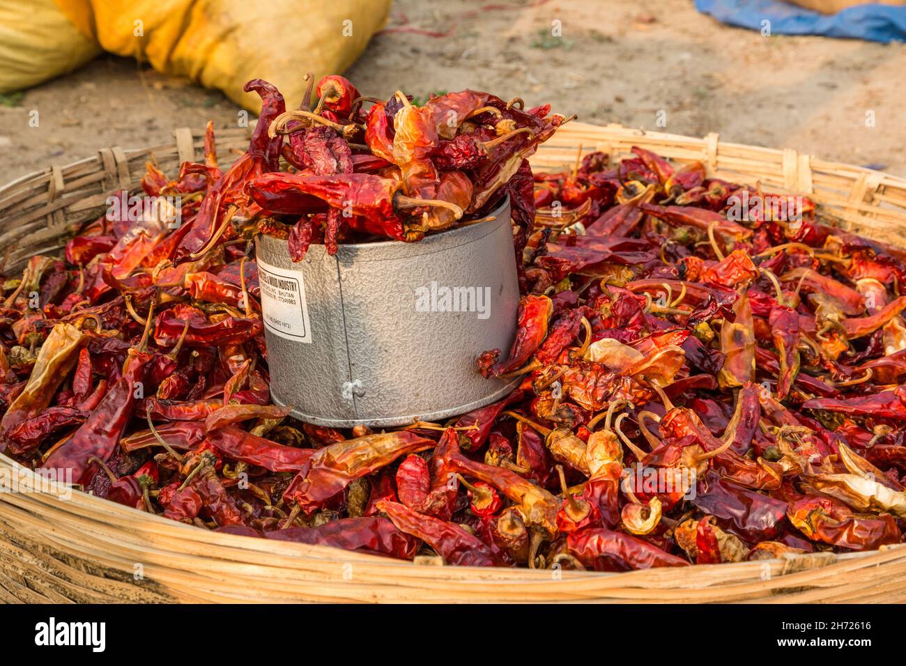 Dried chili peppers for sale in an open market in Bhutan Stock Photo ...