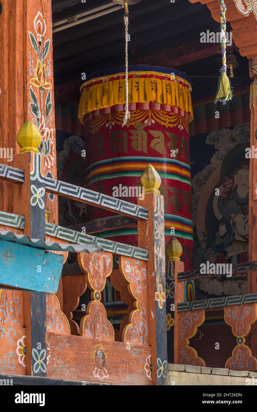 A giant prayer wheel in the Dechen Phodrang Monastery in Thimphu, Bhutan. Stock Photo