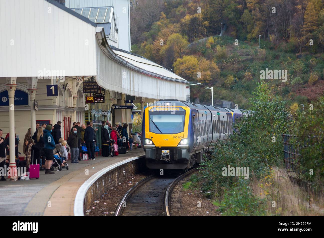 Northern Rail trains pass through the West Yorkshire railway station of