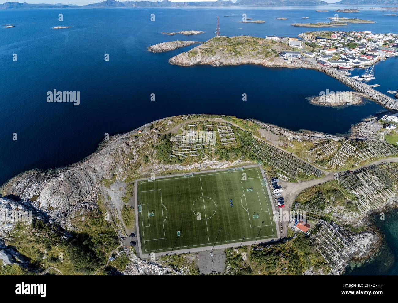 Aerial view over  football stadium on rocky island,  fishing village Henningsvaer,Lofoten, Norway Stock Photo