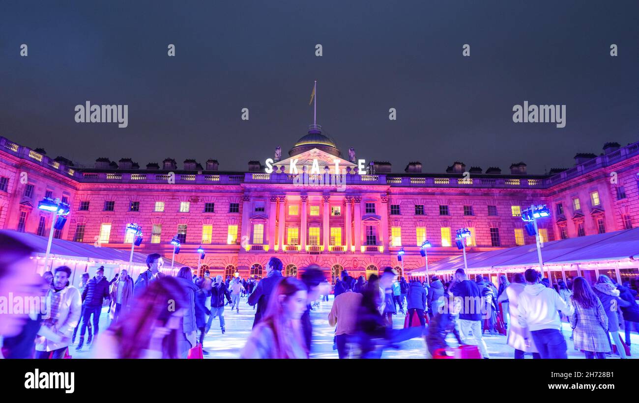 London, UK. 19th Nov, 2021. People enjoy ice skating in the courtyard ...