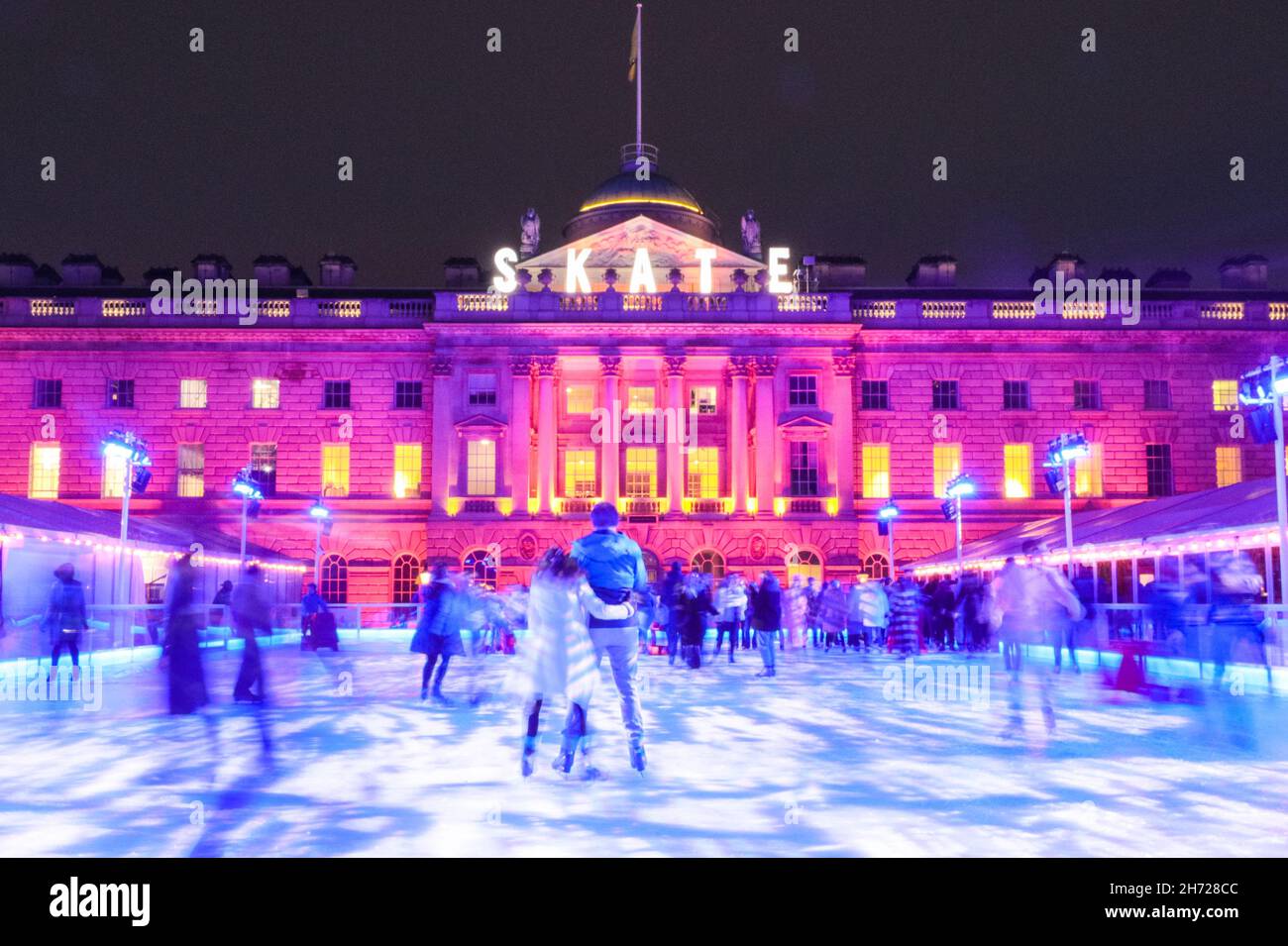 London, UK. 19th Nov, 2021. People enjoy ice skating in the courtyard ...