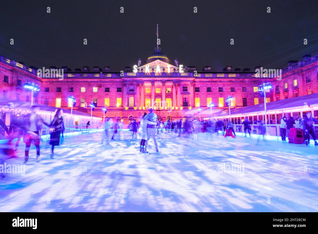 London, UK. 19th Nov, 2021. People enjoy ice skating in the courtyard ...