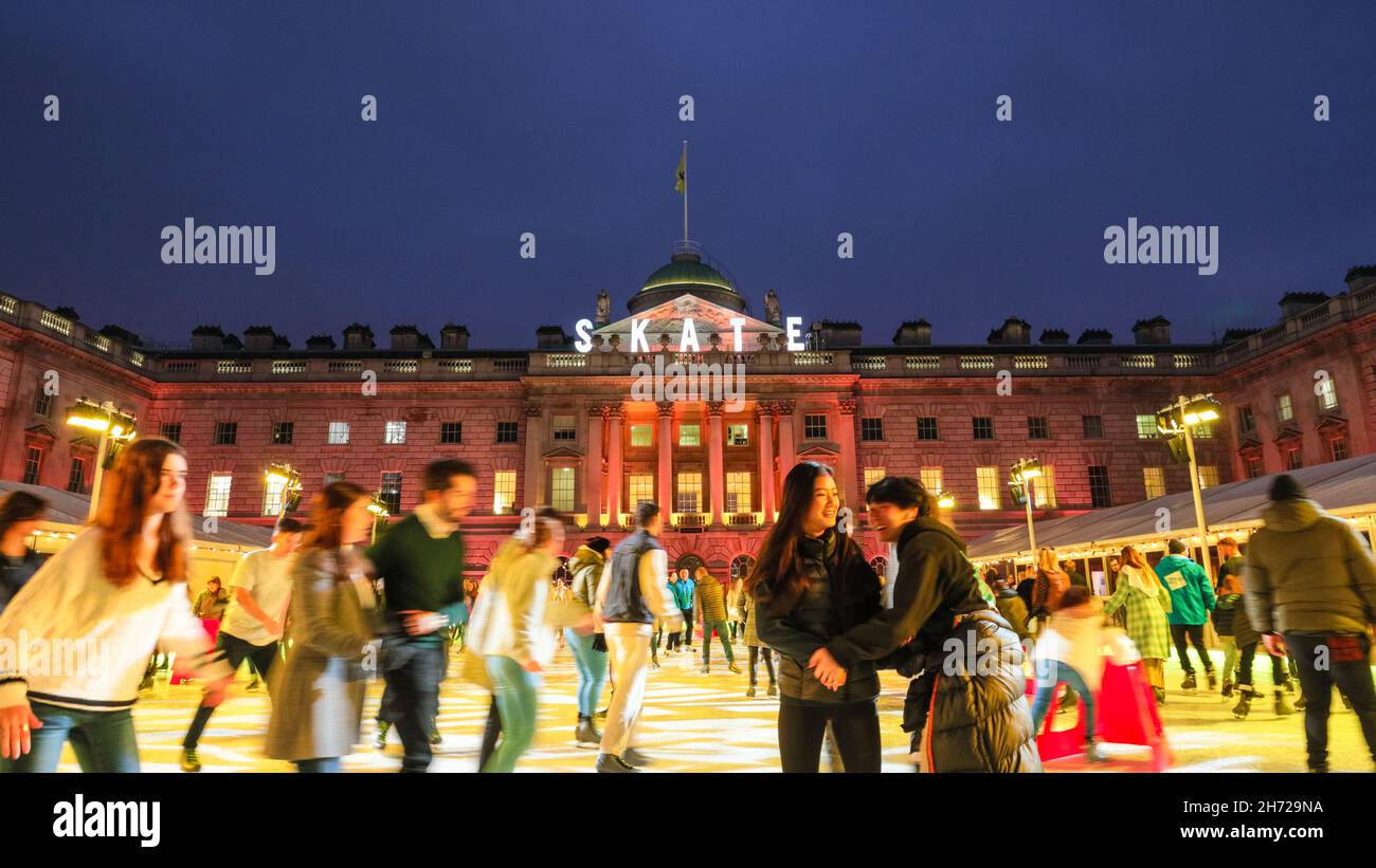 London, UK. 19th Nov, 2021. People enjoy ice skating in the courtyard ...