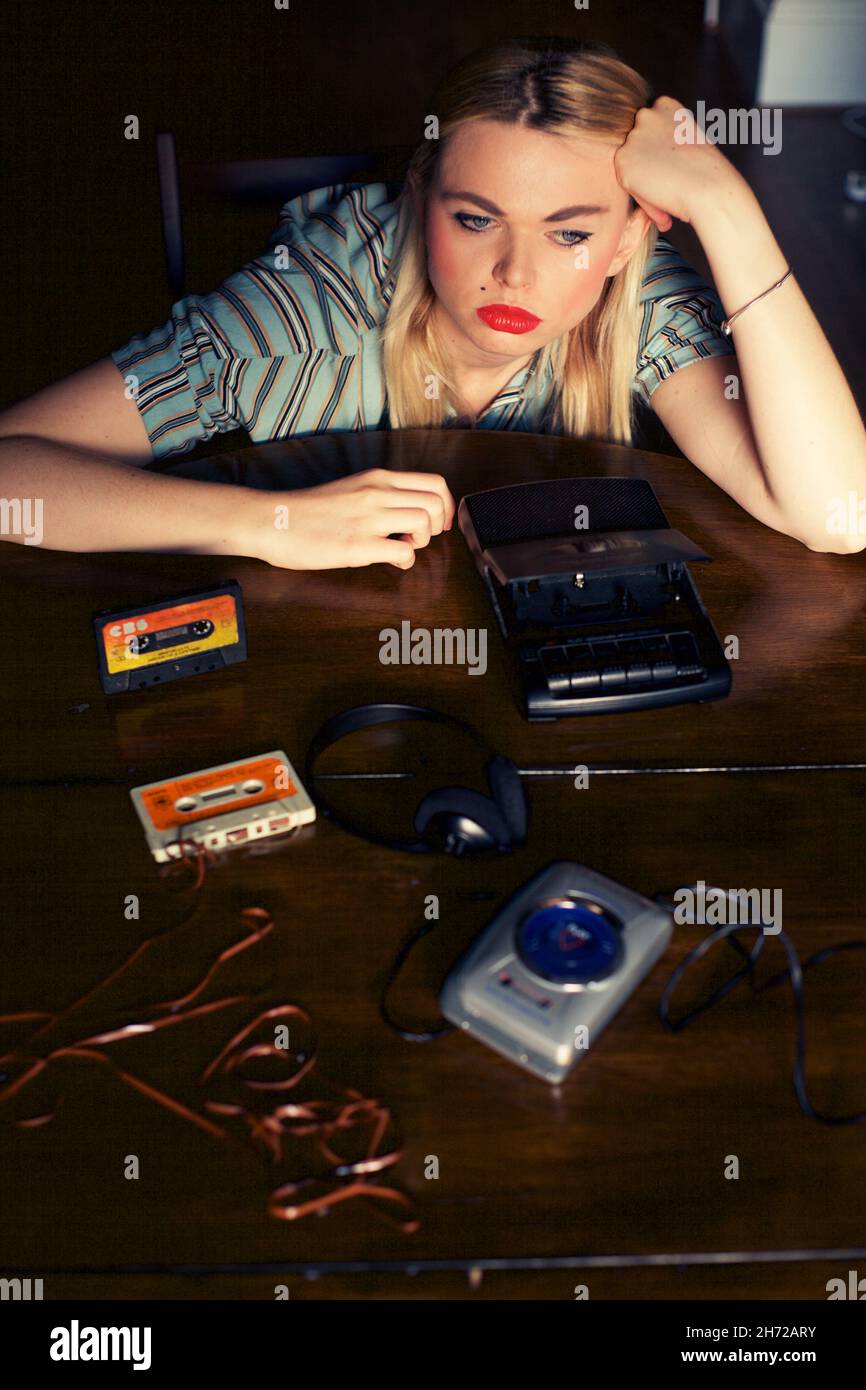 Girl with 80s tape cassette Stock Photo