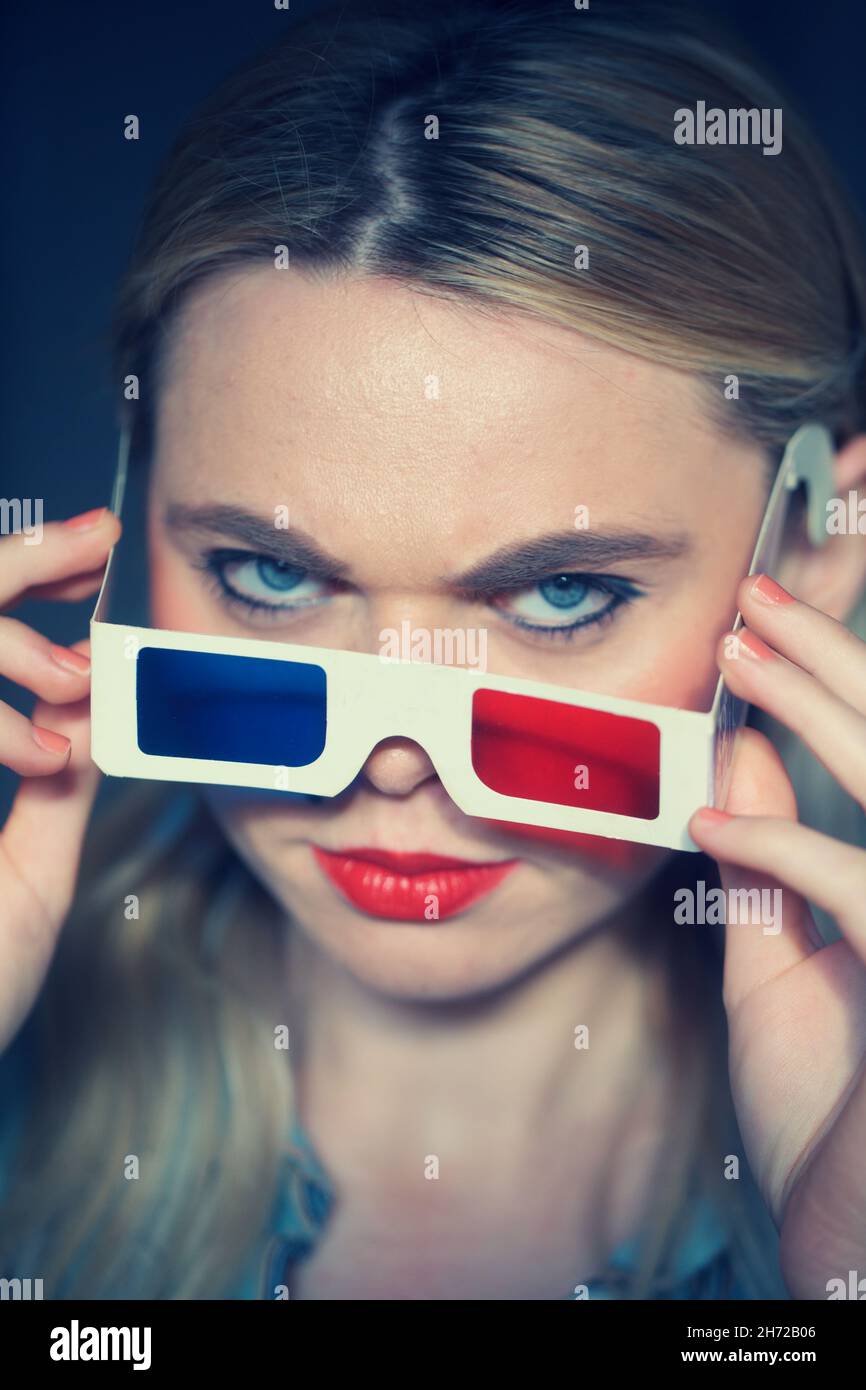 Girl using 3D retro glasses Stock Photo