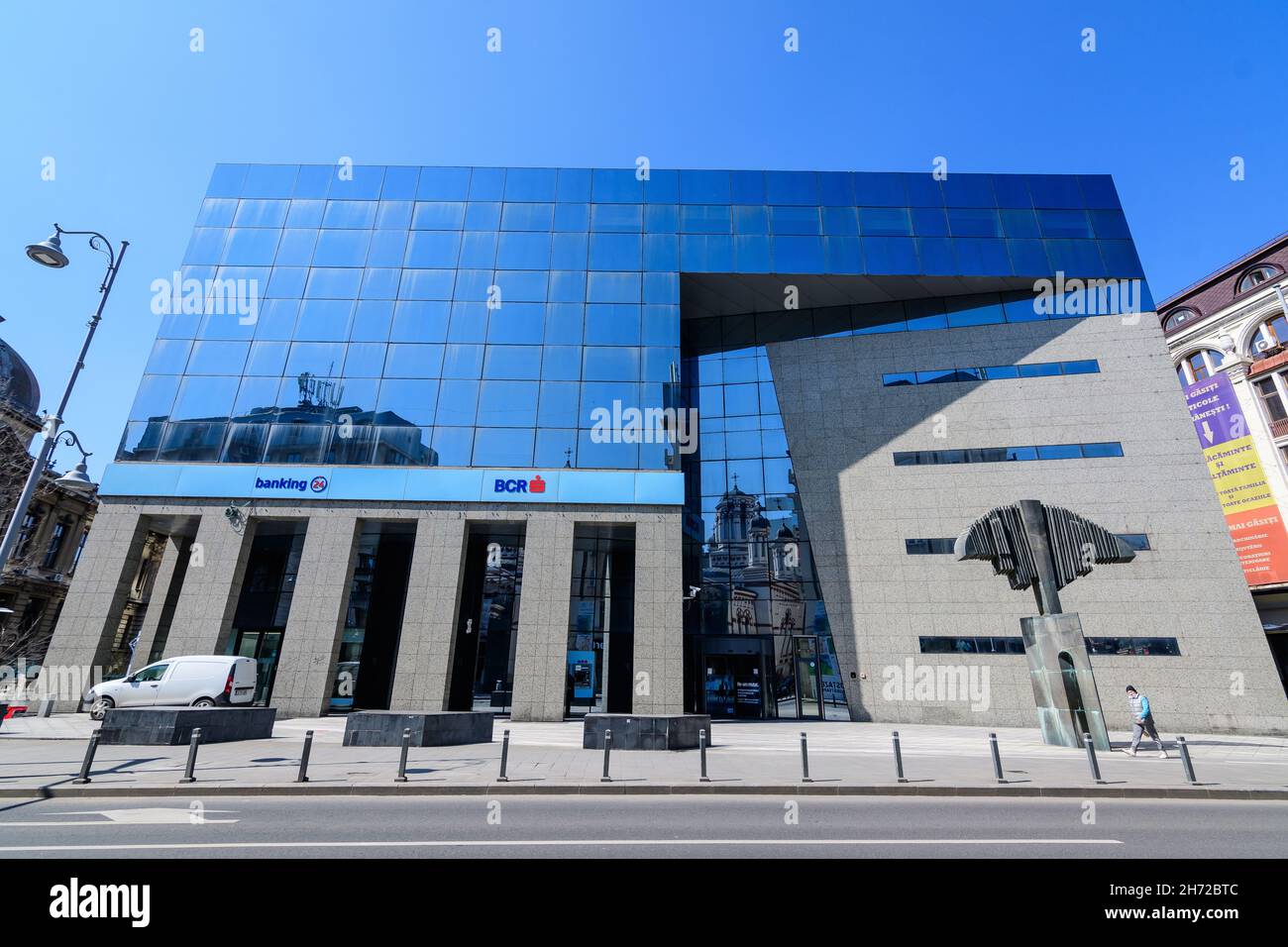 Bucharest, Romania - 27 March 2021: Erste BCR Bank headquarter entrance on Calea Victoriei street in downtown in a sunny spring day Stock Photo