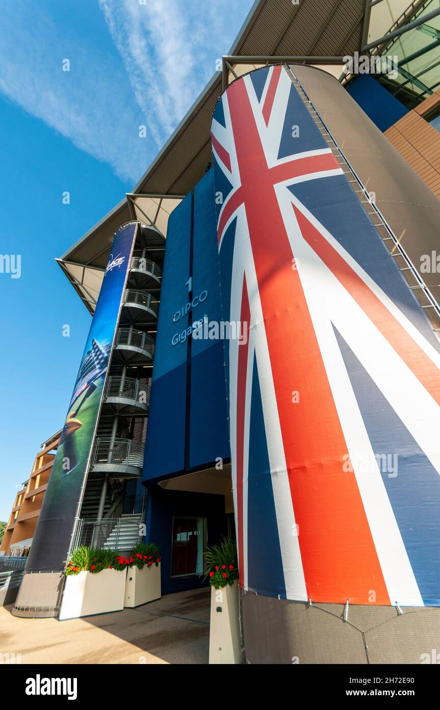 Grandstand at Royal Ascot racecourse, Royal Berkshire, UK, during the Red Bull Air Race event, with Union Jack flag decorations Stock Photo