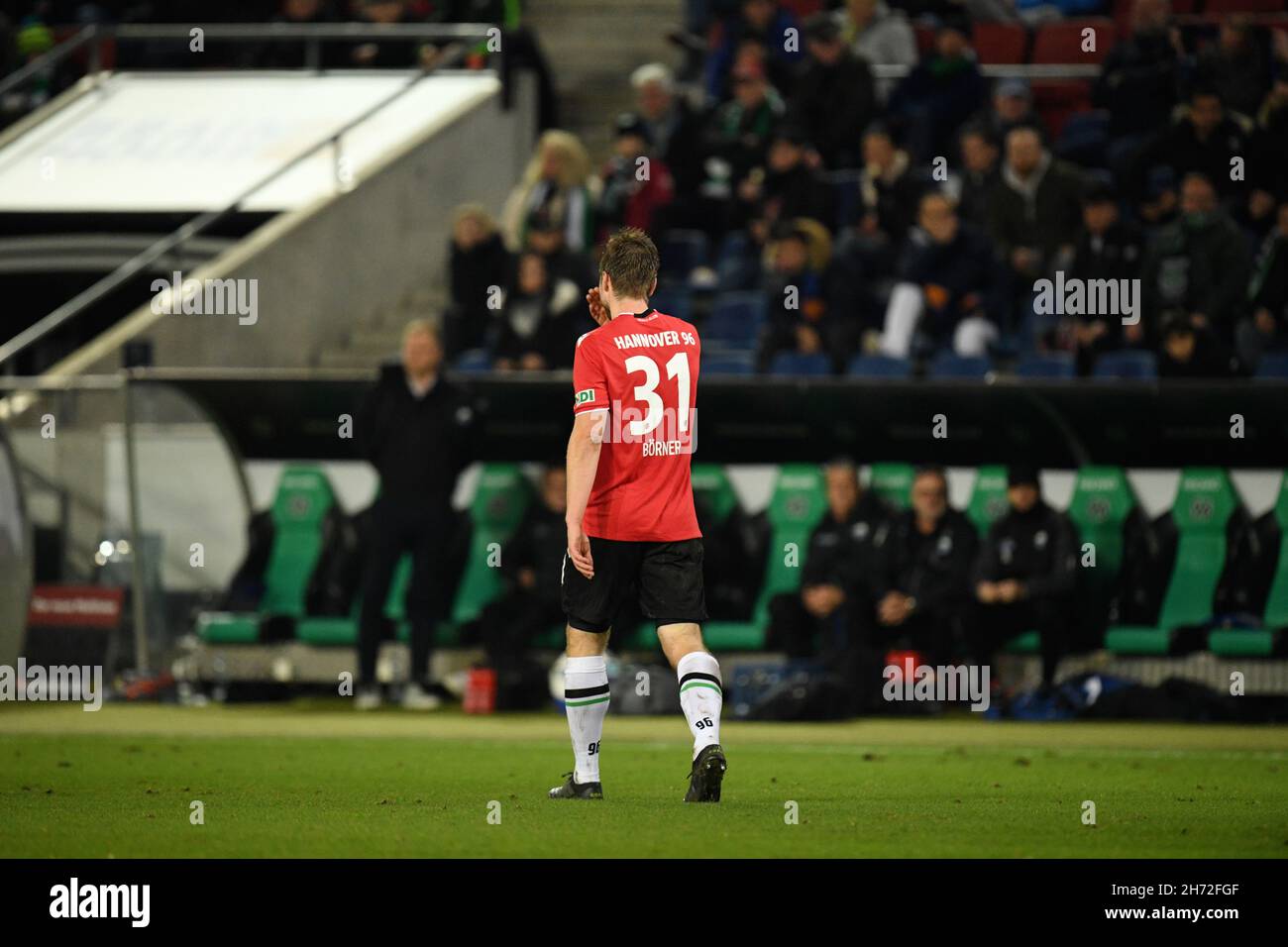 Hanover, Germany. 19th Nov, 2021. Football: 2nd Bundesliga, Matchday 14: Hannover 96 - SC Paderborn 07 at the HDI Arena. Hannover's Julian Börner leaves the pitch after receiving a red card. Credit: Daniel Reinhardt/dpa - IMPORTANT NOTE: In accordance with the regulations of the DFL Deutsche Fußball Liga and/or the DFB Deutscher Fußball-Bund, it is prohibited to use or have used photographs taken in the stadium and/or of the match in the form of sequence pictures and/or video-like photo series./dpa/Alamy Live News Stock Photo