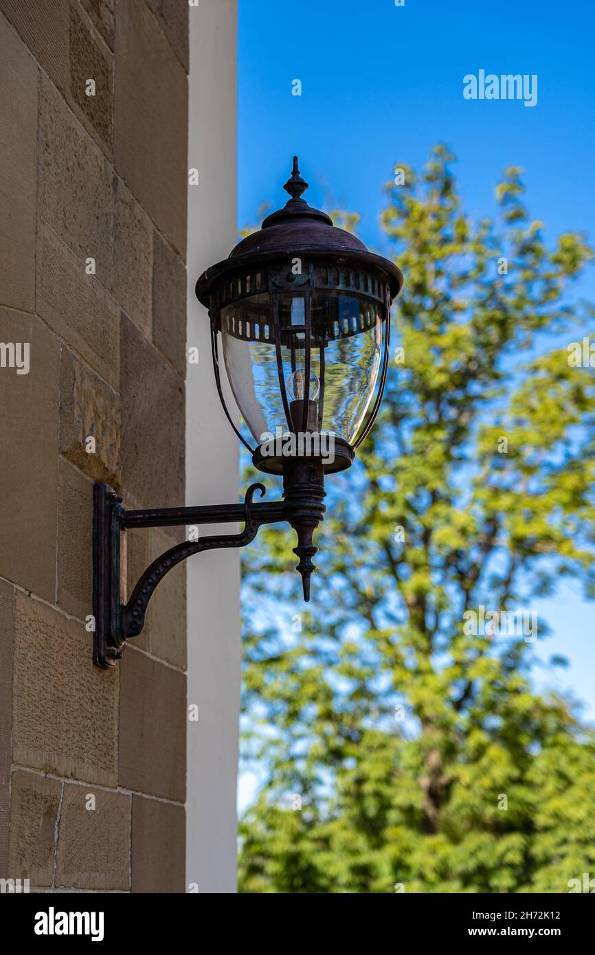 Big lantern on the wall of a historical building Stock Photo