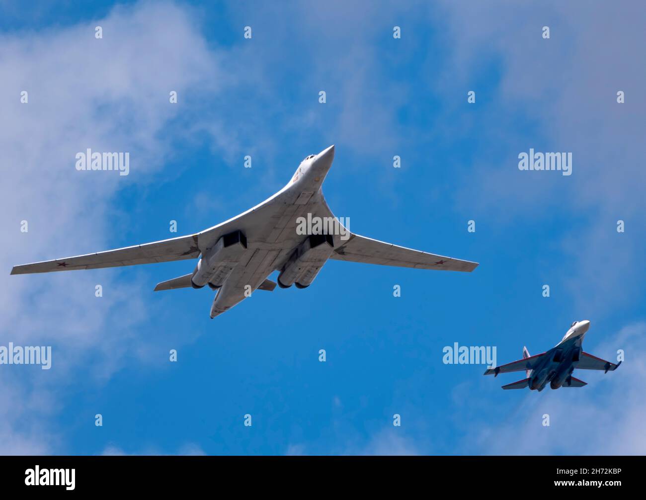 MOSCOW, RUSSIA - MAY 7, 2021: Avia parade in Moscow. su-35 and strategic bomber and missile platform Tu-160 in the sky on parade of Victory in World W Stock Photo