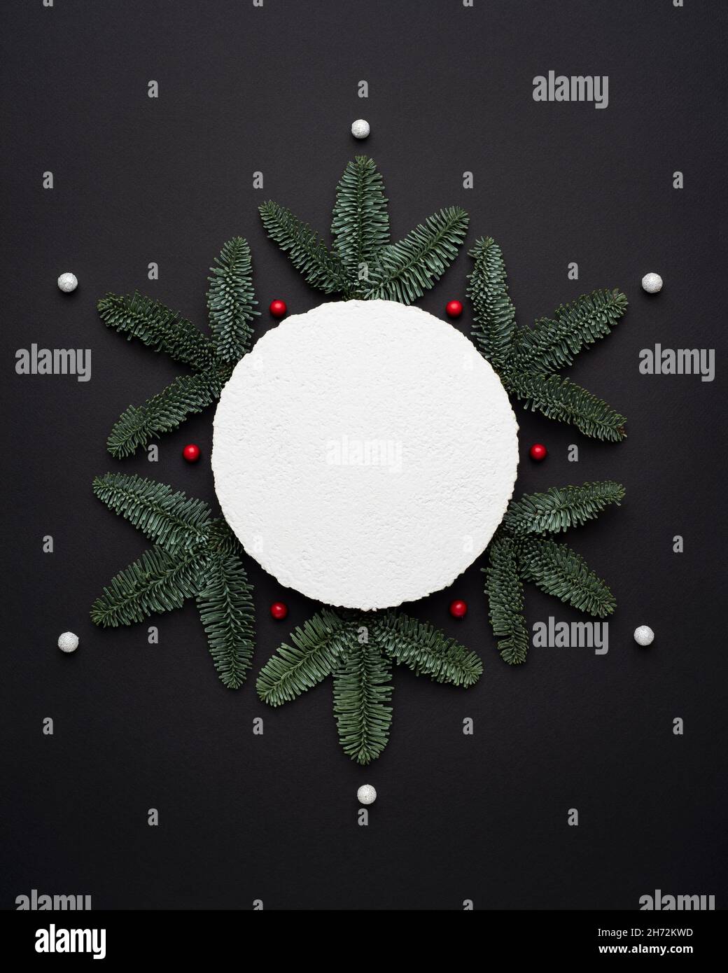 Christmas card with snowflake design and note for message on black background Stock Photo