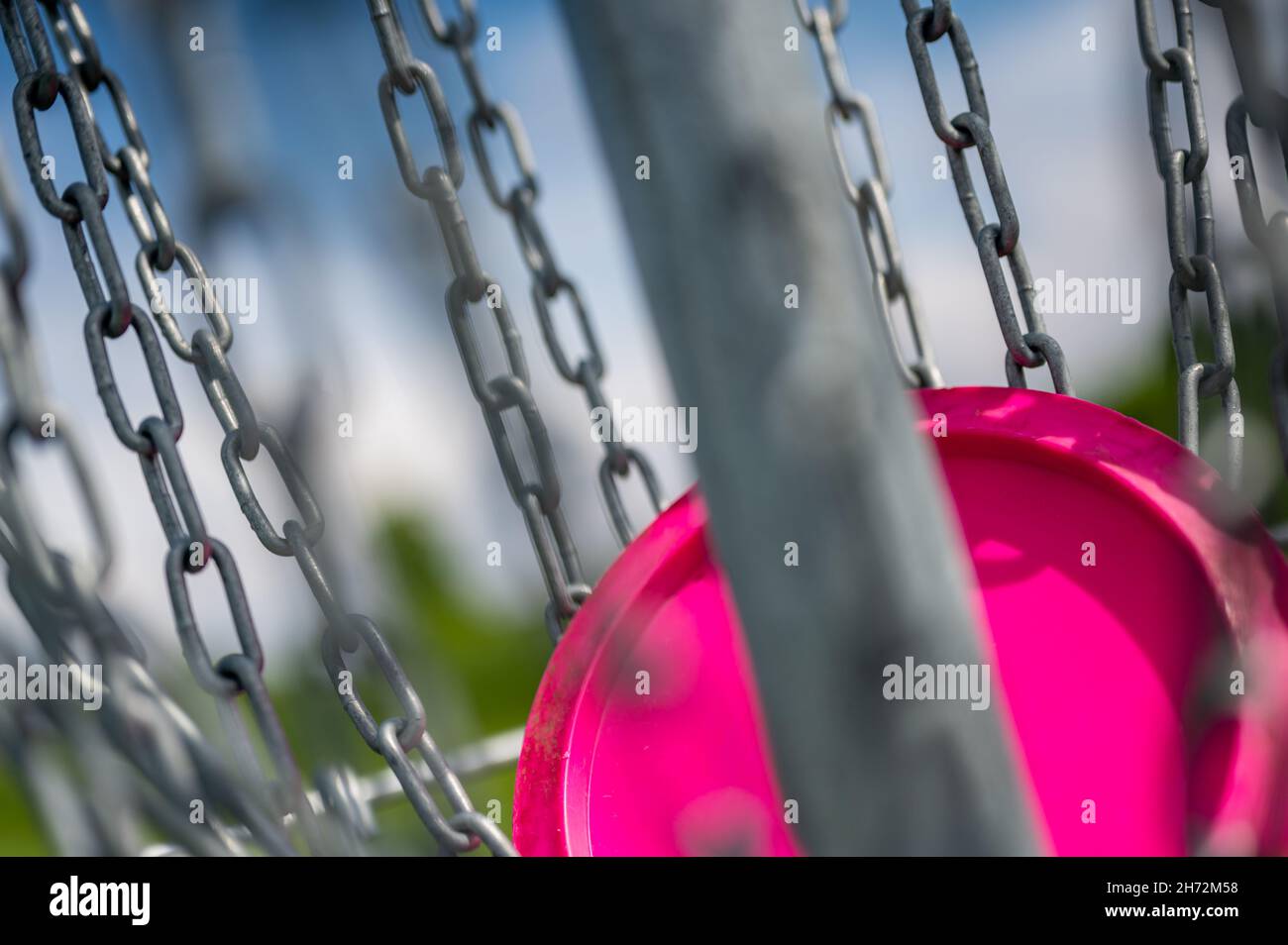 Different angles of view of a disc golf basket and chains Stock Photo Alamy