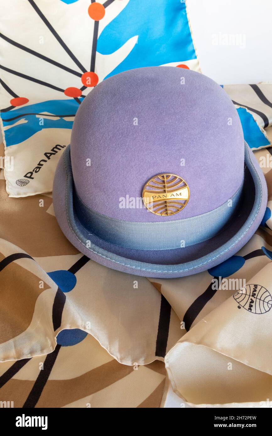 1970's Pan Am Stewardess Bowler Uniform Hat still life on Route Map Scarf Background, USA Stock Photo