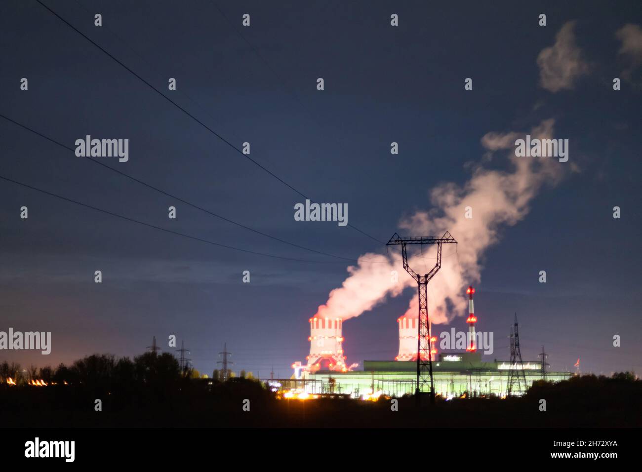 radiation near a nuclear power plant. Night emissions Stock Photo