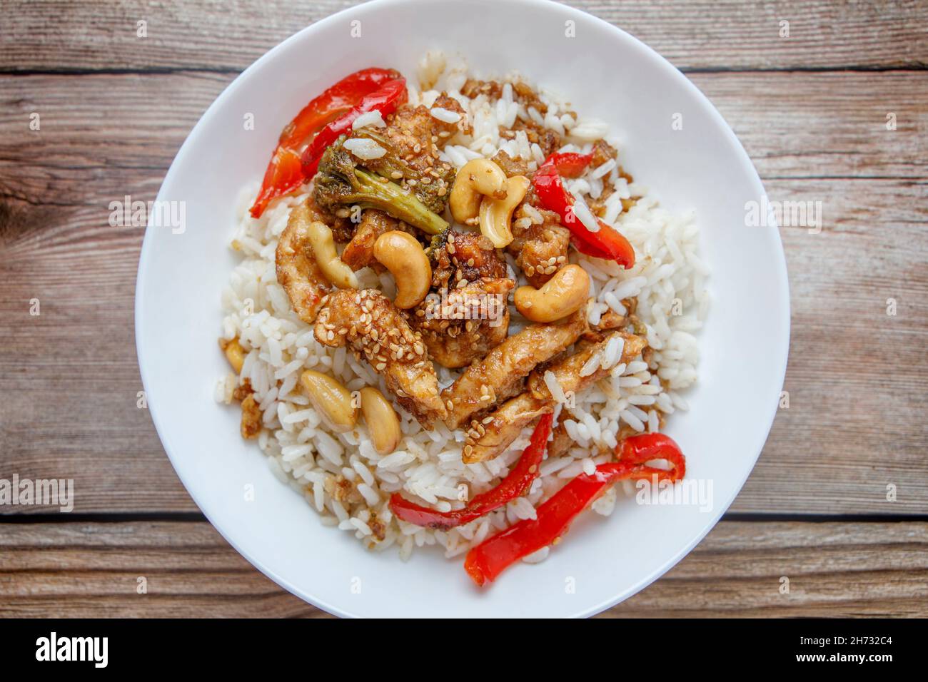 Teriyaki chicken with rice, bell pepper and sesame Stock Photo Alamy