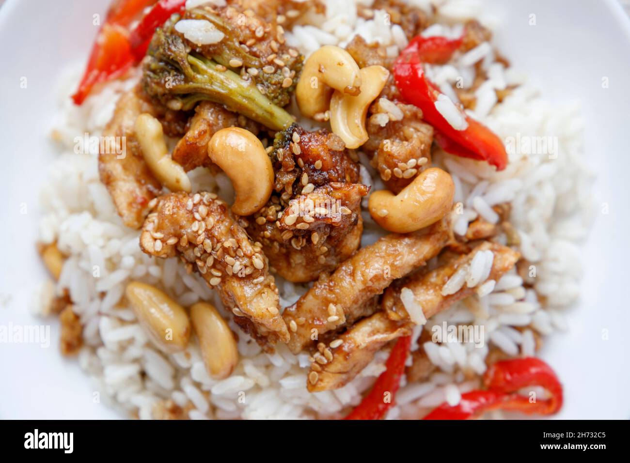 Teriyaki chicken with rice, bell pepper and sesame Stock Photo Alamy