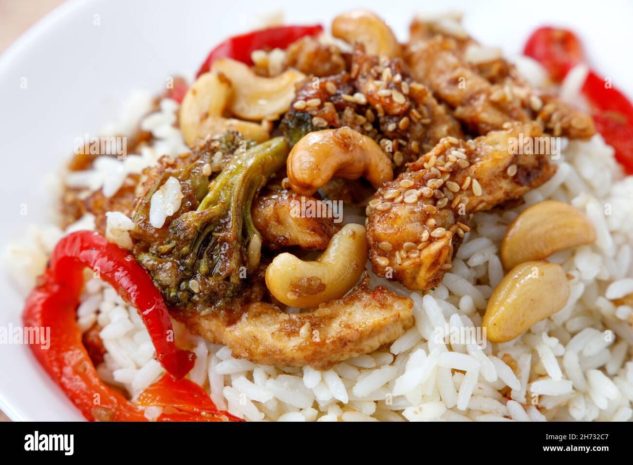 Teriyaki chicken with rice, bell pepper and sesame Stock Photo Alamy