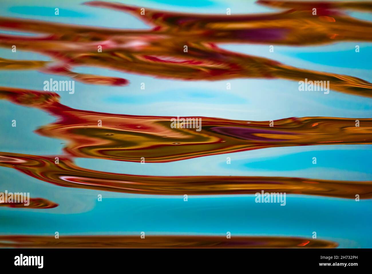 colorfull reflection in water. River Ganges, India Stock Photo