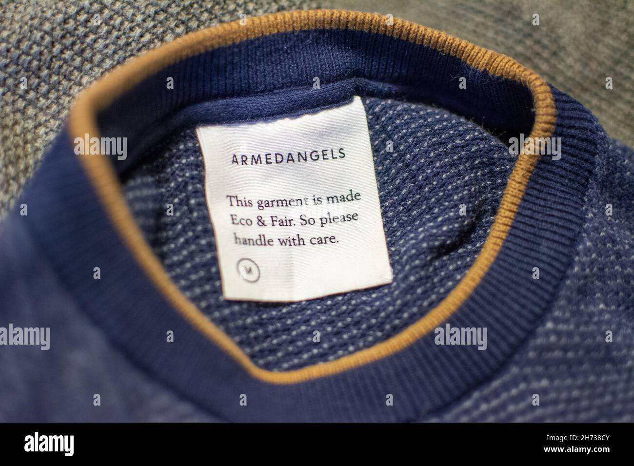 Gymnastiek troon nul ANTWERP, BELGIUM - Nov 17, 2021: Close-up shot of Nudie Jeans brand tag or  label in garment. Selective focus Stock Photo - Alamy
