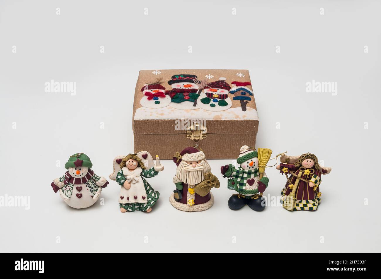 Miniature Christmas decorations with a closed storage box. Stock Photo