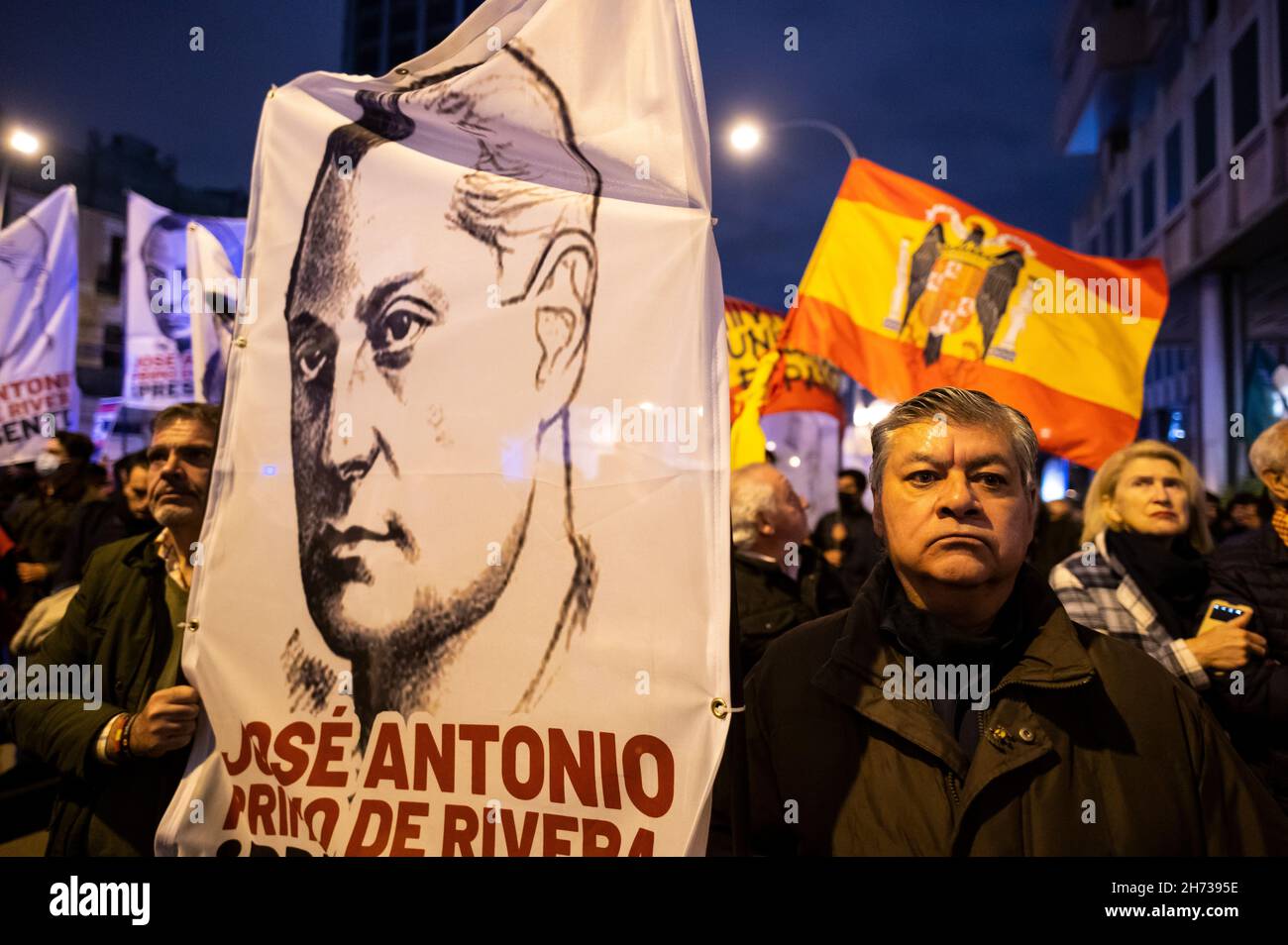 Madrid, Spain. 19th Nov, 2021. Far right wing members and supporters of La Falange are seen carrying banners and pre-constitutional flags during a demonstration for the anniversary of the death of Jose Antonio Primo de Rivera, founder of La Falange, commemorating the 85th anniversary of his death on 20 November 1936, shot at the beginning of the Spanish Civil War. Credit: Marcos del Mazo/Alamy Live News Stock Photo