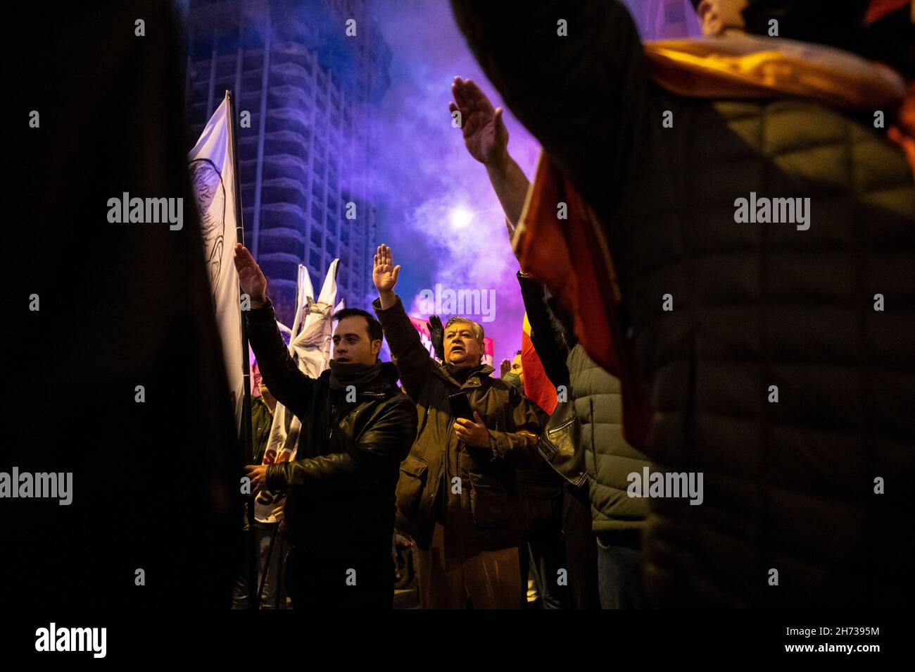 Madrid, Spain. 19th Nov, 2021. Far right wing members and supporters of La Falange are seen raising their hands making a fascist salute during a demonstration for the anniversary of the death of Jose Antonio Primo de Rivera, founder of La Falange, commemorating the 85th anniversary of his death on 20 November 1936, shot at the beginning of the Spanish Civil War. Credit: Marcos del Mazo/Alamy Live News Stock Photo