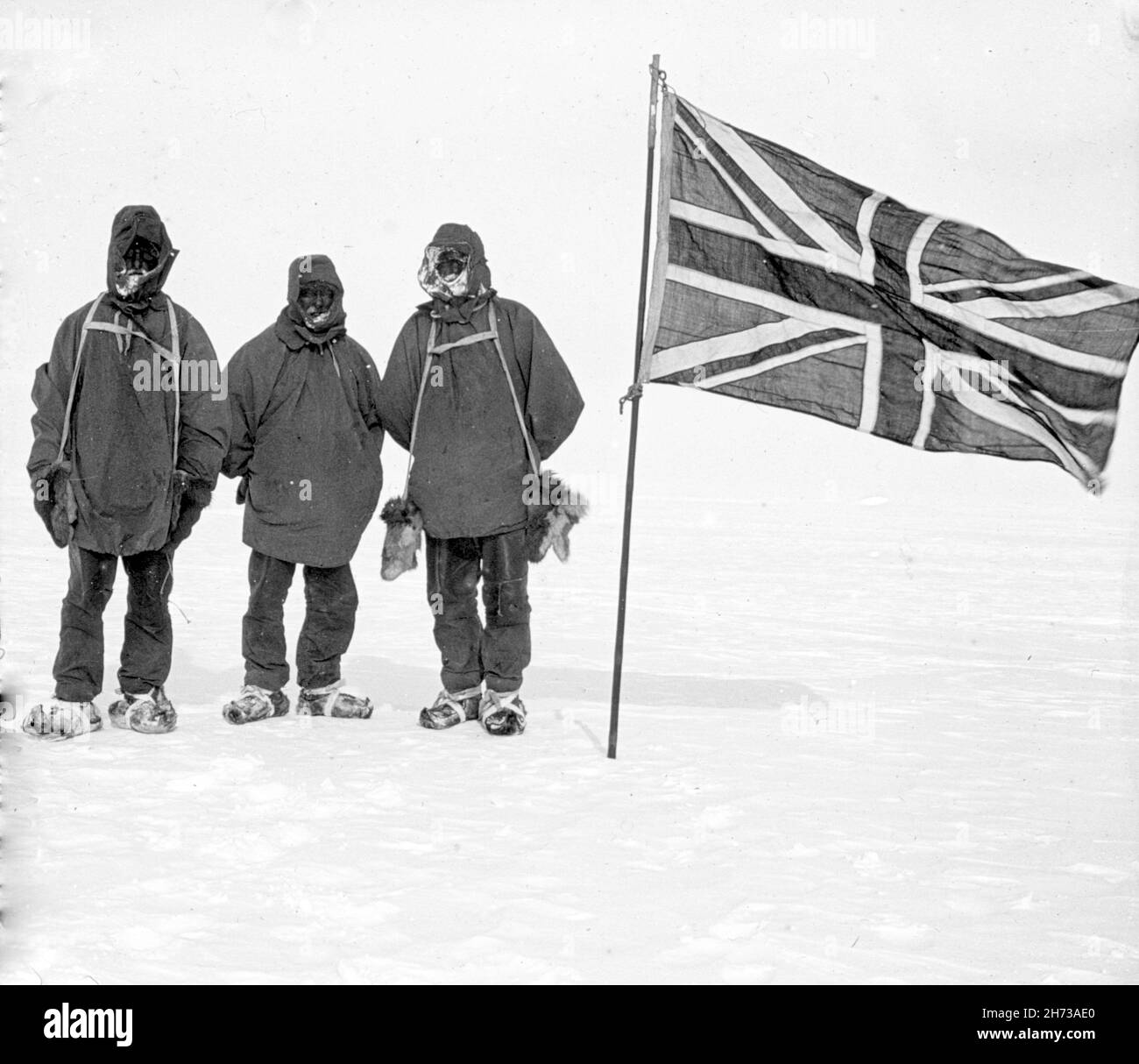Members of the Ernest Shackleton Nimrod expedition to reach the South Pole in 1907-1909. They are at their most southerly point, at 88 degress 23 minutes south. Stock Photo
