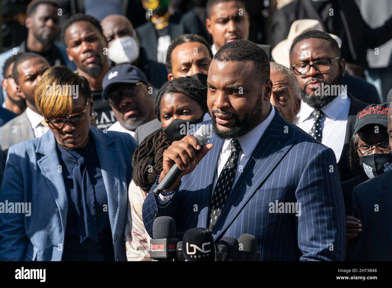 Attorney Lee Merritt, addresses more than 500 black pastors and supporters  demanding justice for slain black jogger Ahmaud Arbery outside the Glynn  County Courthouse November 18, 2021 in Brunswick, Georgia. The trial