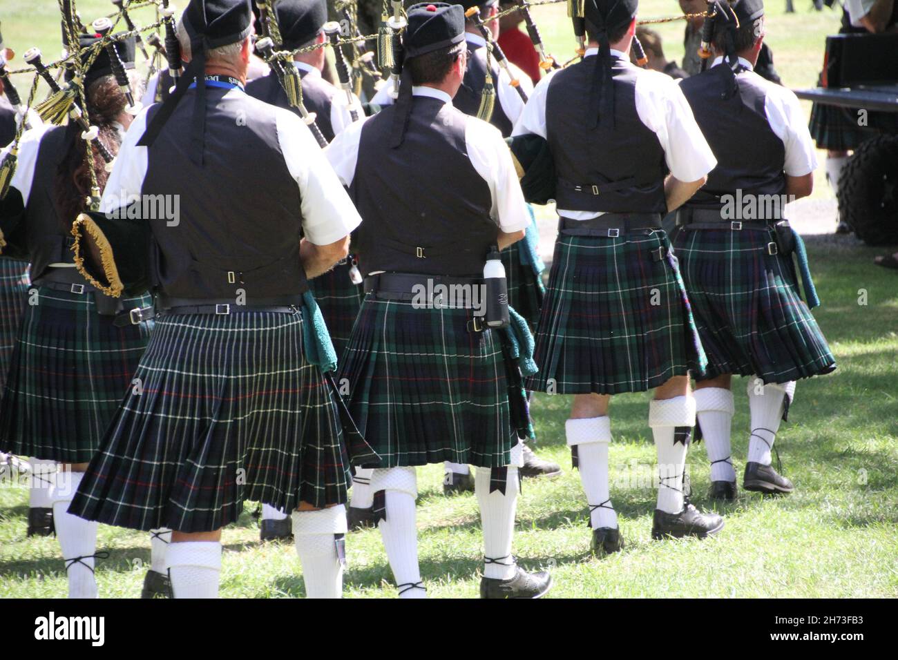 Scottish marching band with plaid kilts and bagpipes Stock Photo Alamy