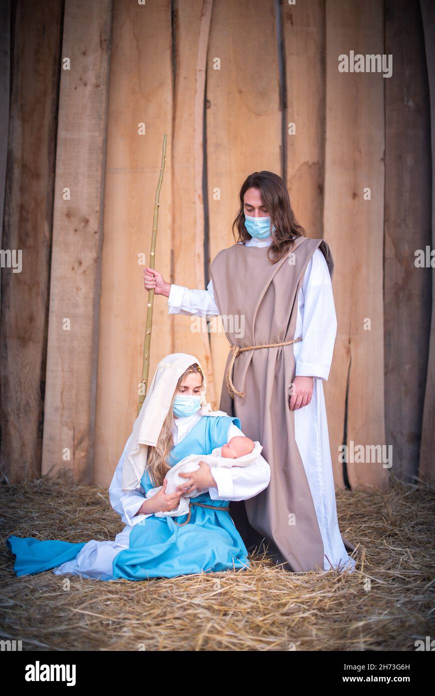 Nativity scene with the characters wearing facial masks Stock Photo Alamy