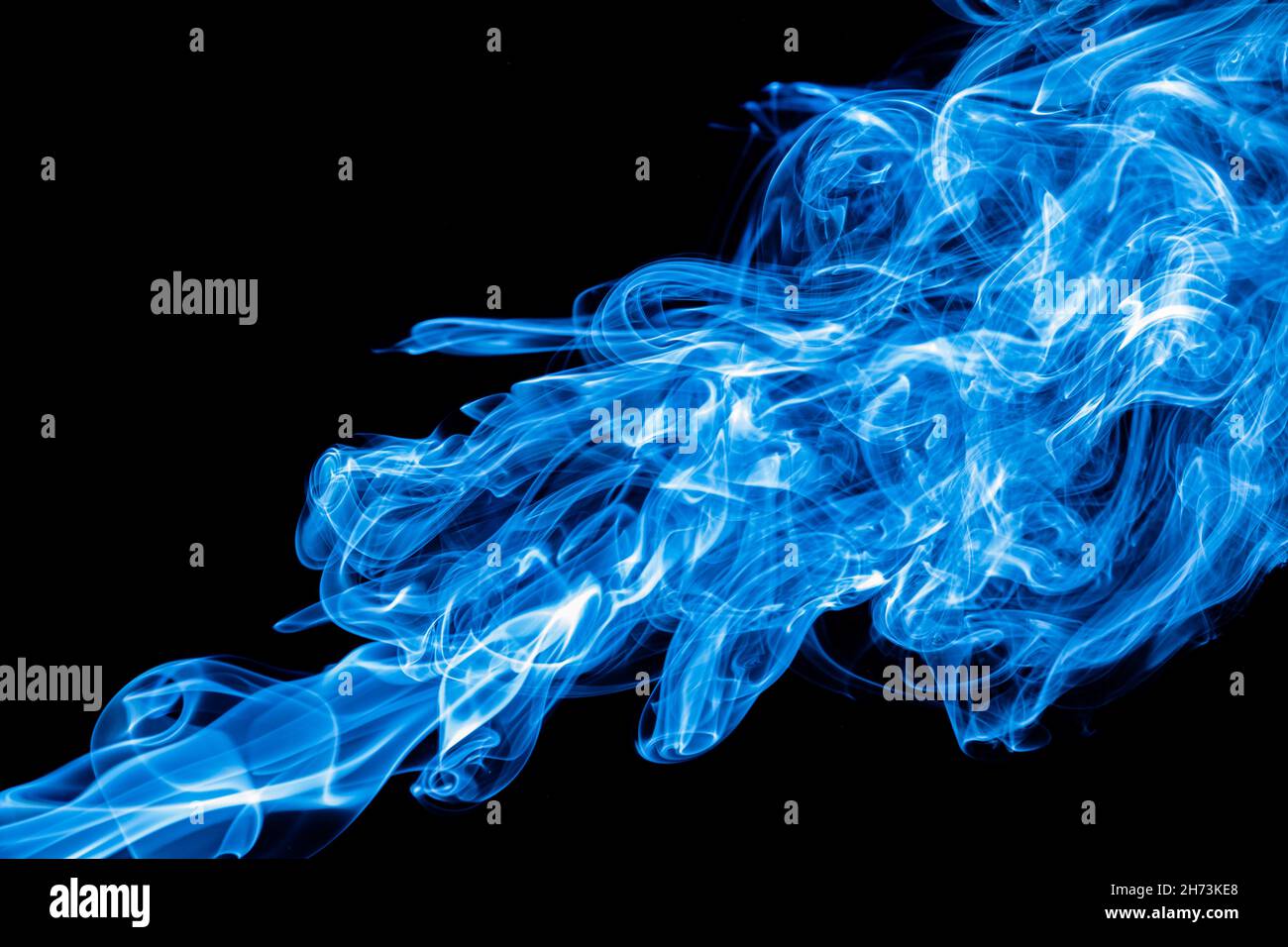 Blue color abstract smoke on black background Stock Photo - Alamy