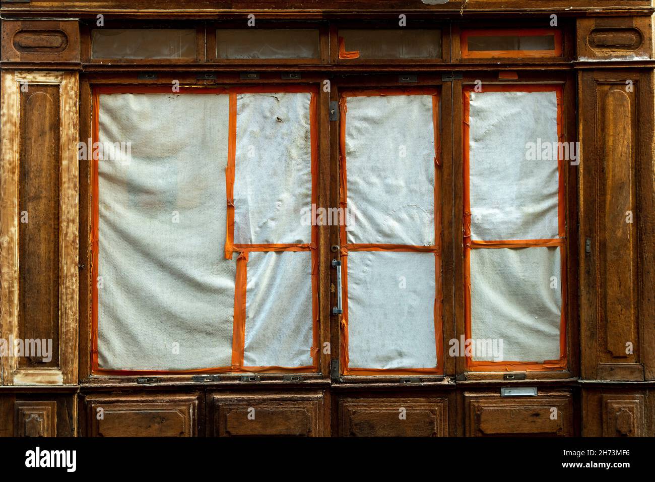 Old shop closed. FranceOld closed shop with old window frames Stock Photo