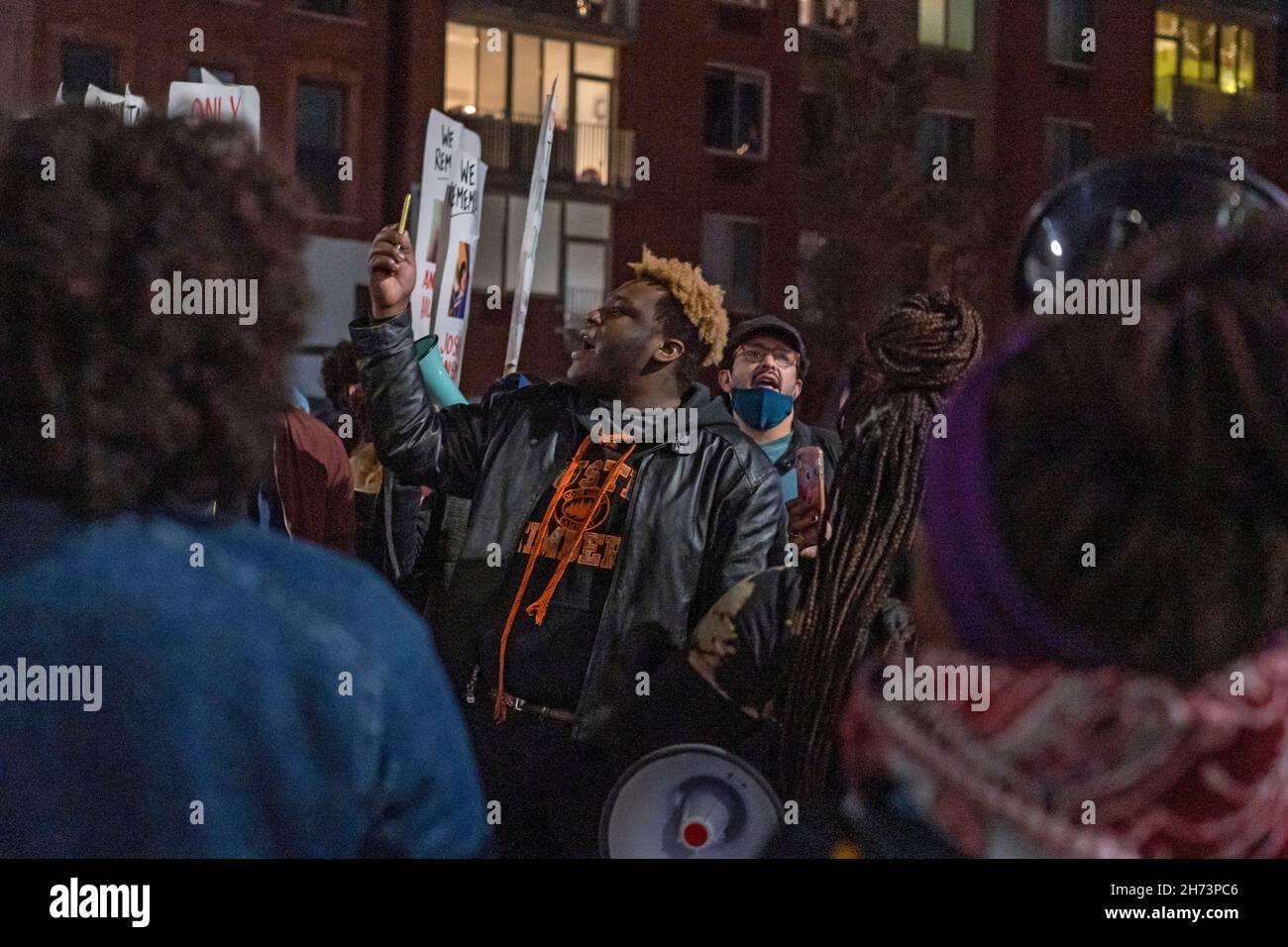 A protester streams during a protest march in Brooklyn against the acquittal of Kyle Rittenhouse in New York City.Hundreds march through Brooklyn to protest Rittenhouse verdict and calling his acquittal a double standard and a failure of the justice system. Kyle Rittenhouse (18) faced homicide charges and other offenses in the fatal shootings of Joseph Rosenbaum and Anthony Huber and for shooting and wounding of Gaige Grosskreutz during unrest in Kenosha that followed the police shooting of Jacob Blake in August 2020. (Photo by Ron Adar / SOPA Images/Sipa USA) Stock Photo