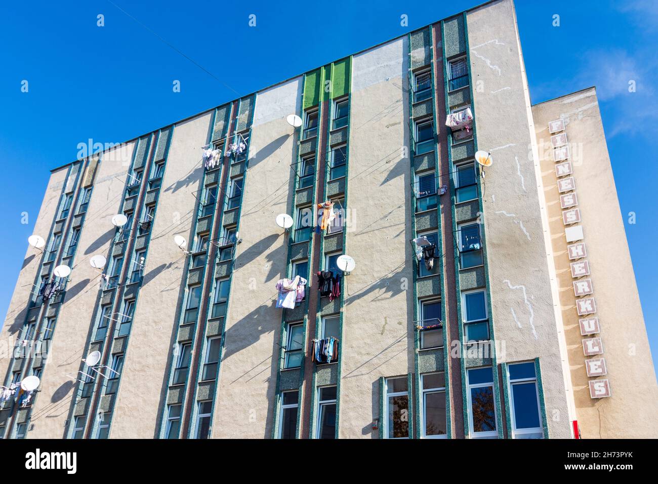 Nove Mesto nad Vahom (Neustadt an der Waag): run down block of flats from socialist time with satellite dishes and clothes drying on racks in , , Slov Stock Photo