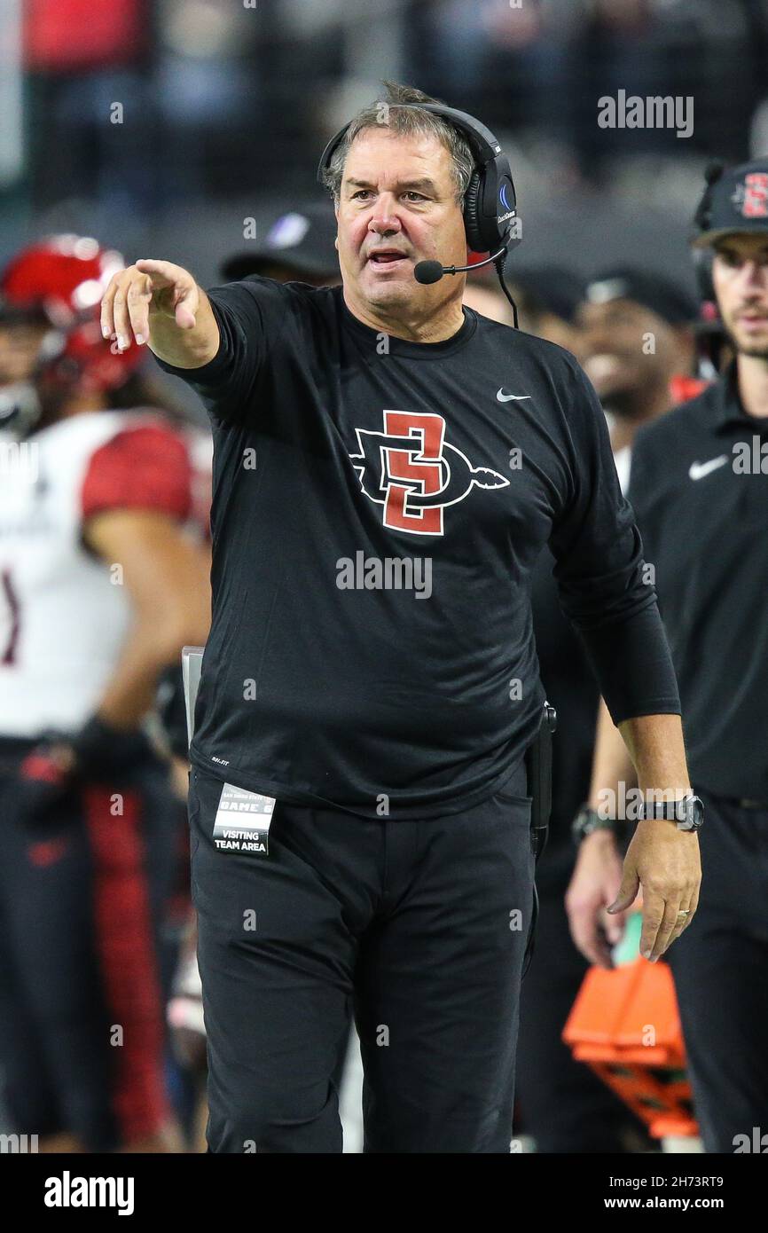 November 19, 2021: San Diego State Aztecs head coach Brady Hoke points  towards the field during the NCAA football game featuring the San Diego  State Aztecs and the UNLV Rebels at Allegiant