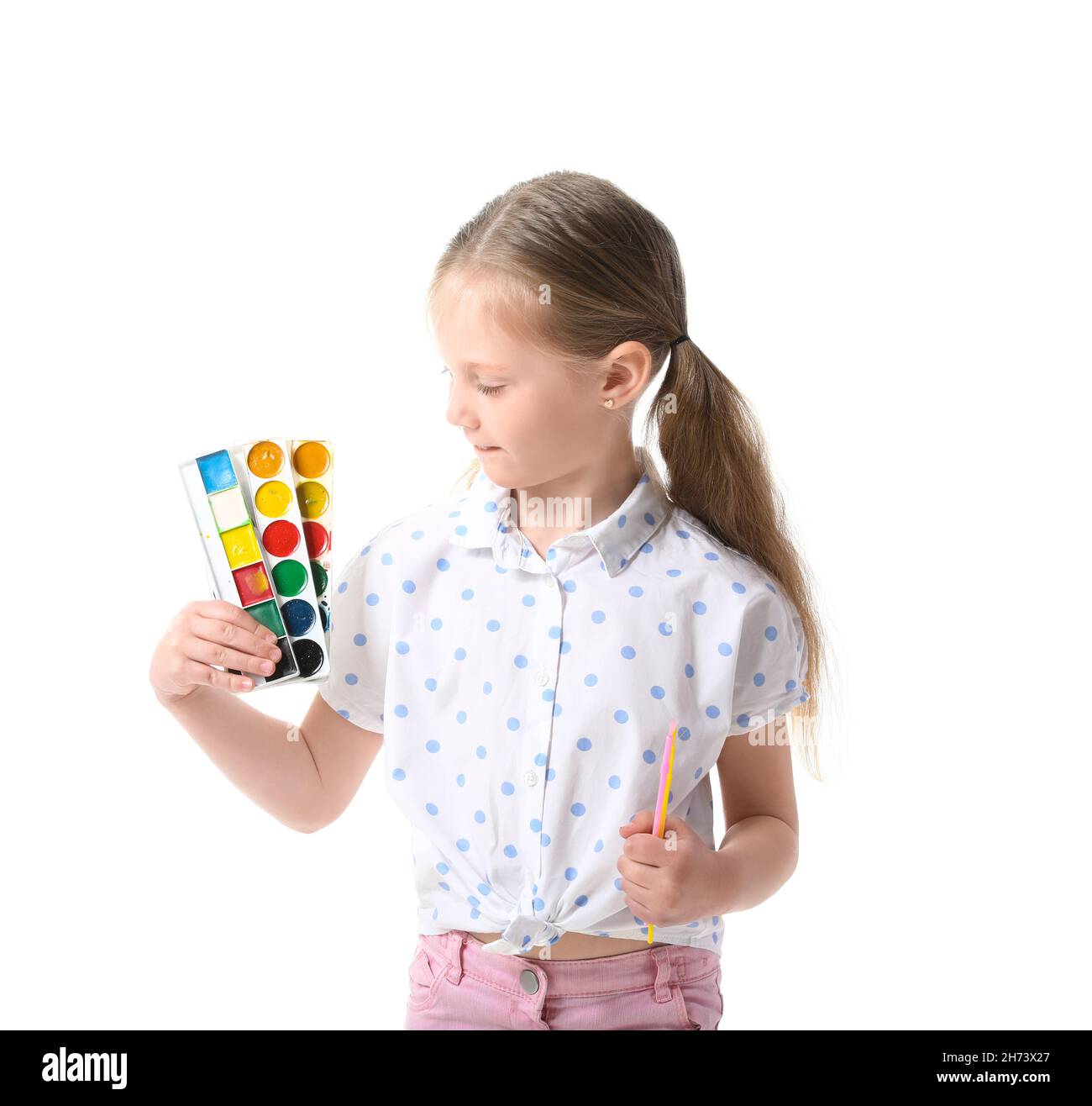 Cute little girl with watercolor paints and brushes on white background ...