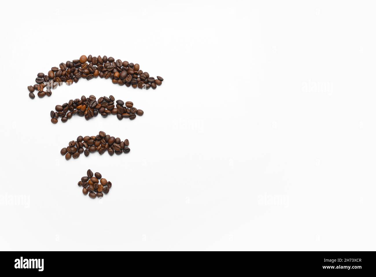 WiFi symbol made from coffee beans on white background Stock Photo Alamy
