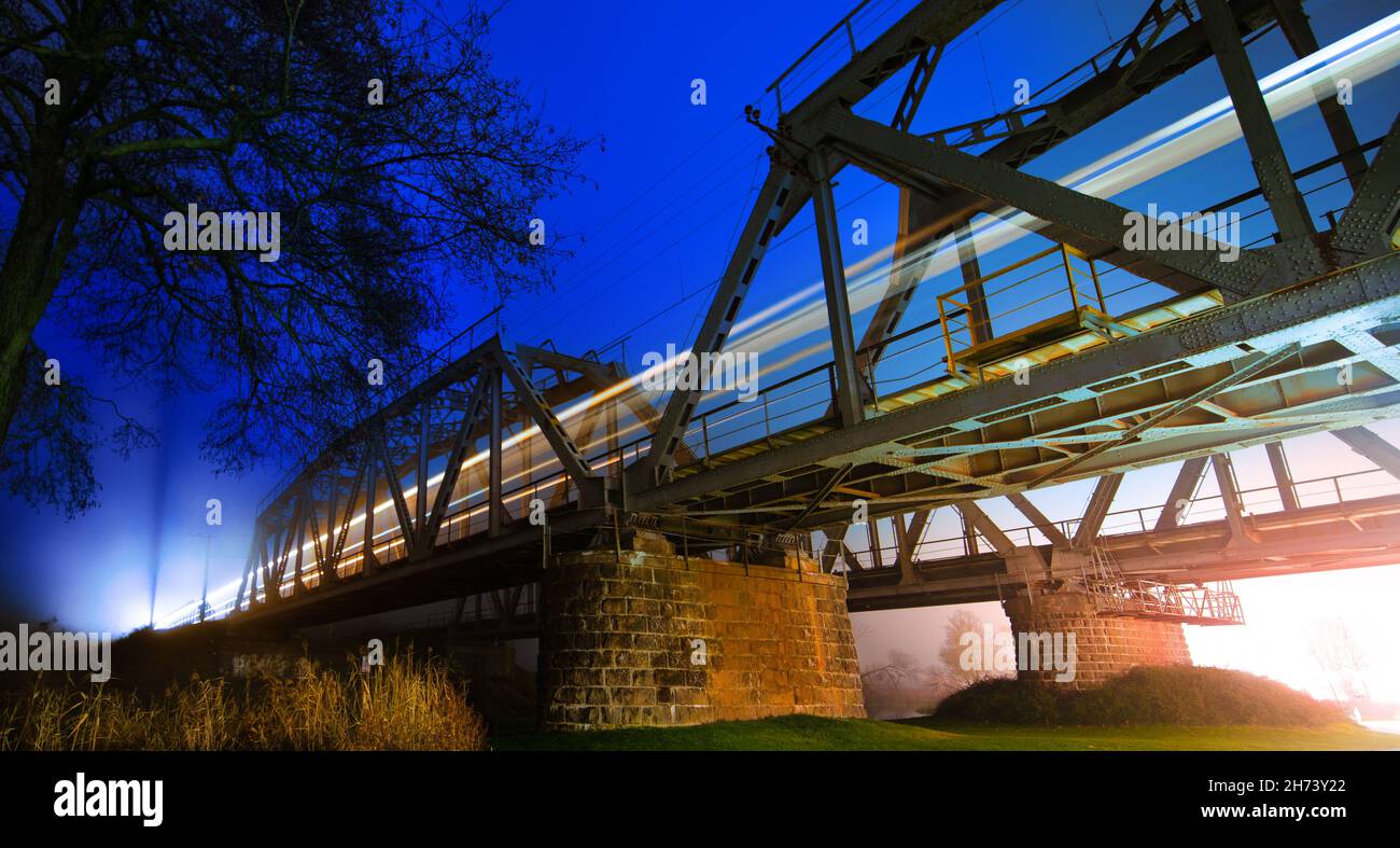 Night landscape, the train travels by rail Stock Photo Alamy