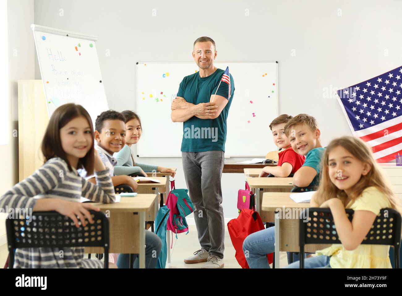 Pupils and teacher during lesson at language school Stock Photo