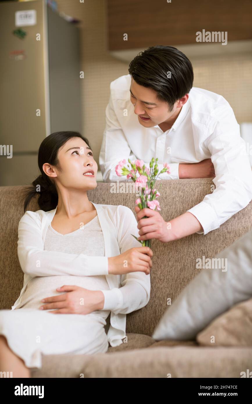 Husband sending his wife flowers Stock Photo Alamy
