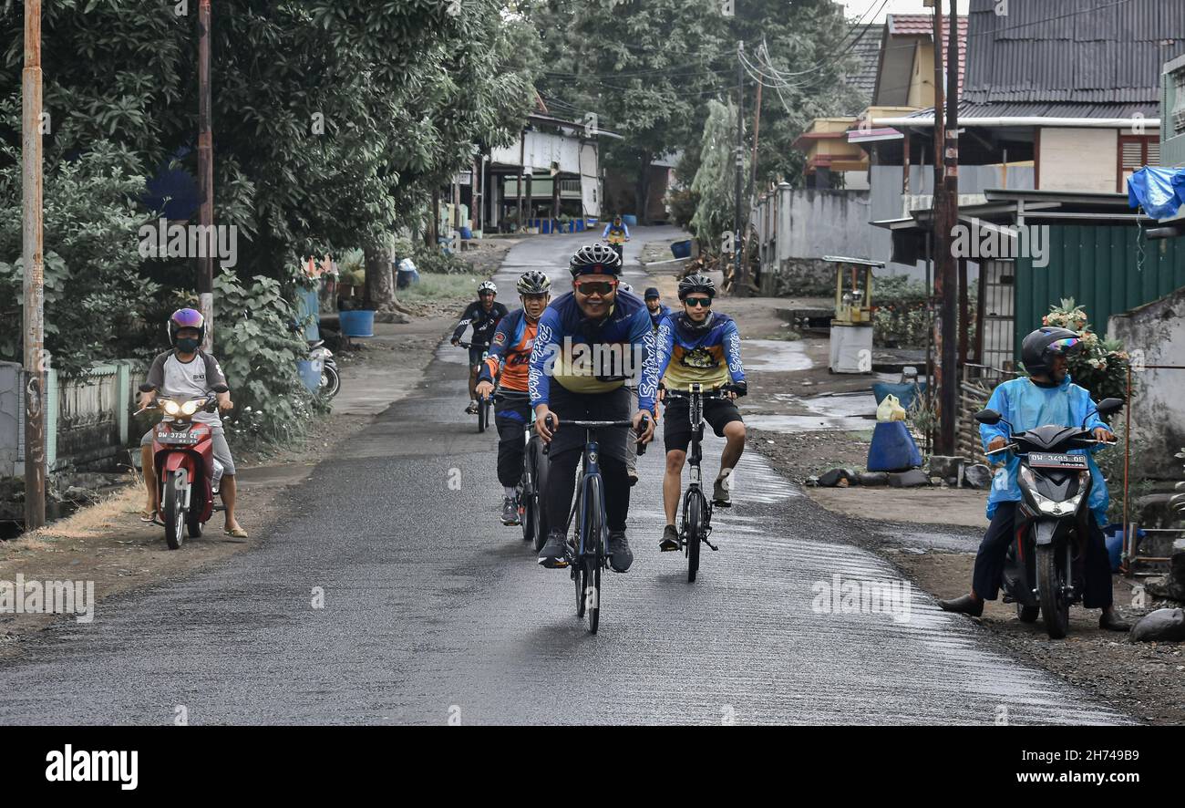 Indonesia bicycle riding hi res stock photography and images