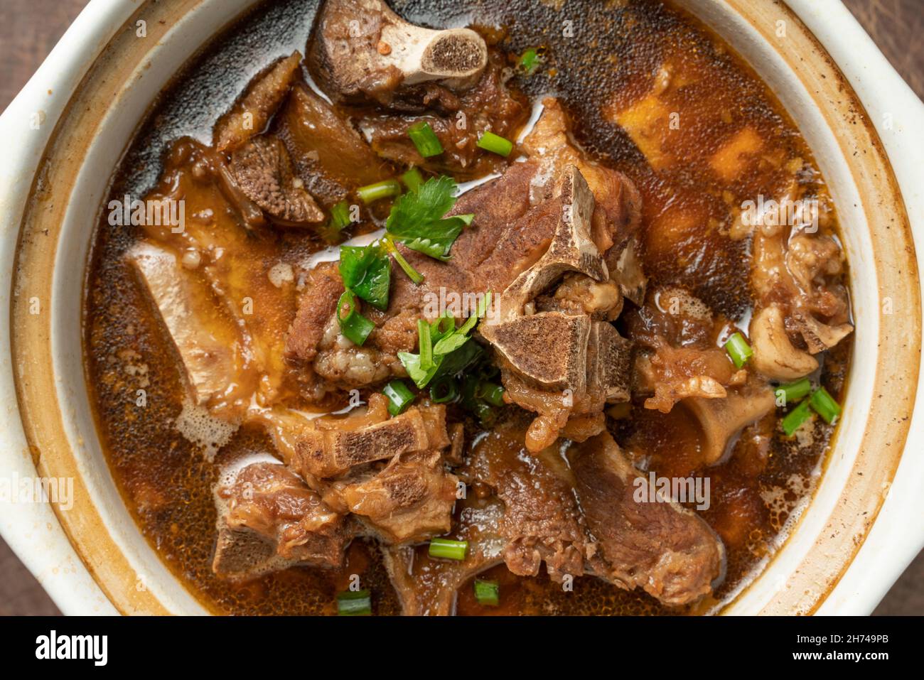 A pot of Chinese stewed sheep Stock Photo