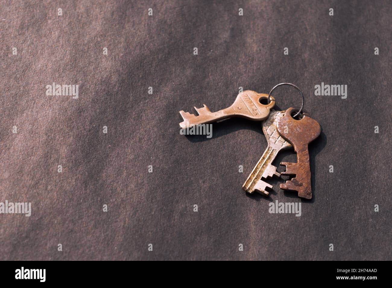 Bunch of old House Key isolated on a rustic Floor. High Angle View ...