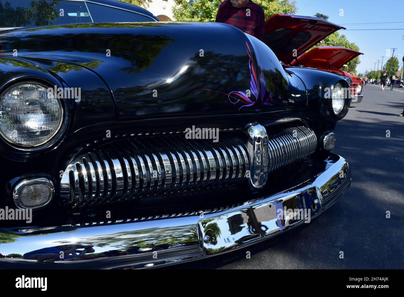 FRESNO, UNITED STATES - Oct 09, 2021: A closeup shot of a beautiful classic black 1949 Mercury Coupe car parked outside Stock Photo