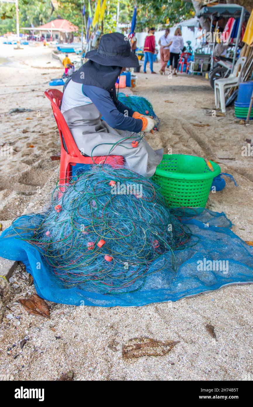 Fishing net repair hi-res stock photography and images - Alamy