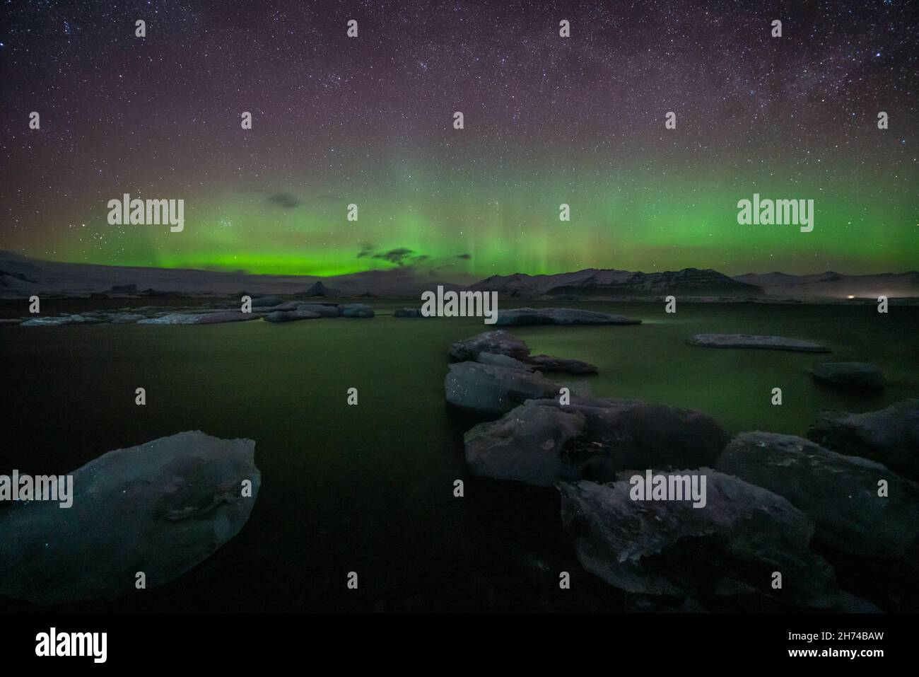 Incredible Aurora Borealis activity above the coast in Iceland Stock ...